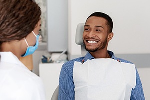 Man smiles after getting direct dental bonding in Friendswood