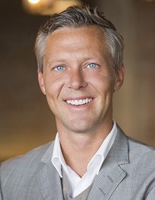 Man with dentures smiling