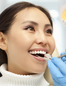 Woman with healthy teeth and gums after chao pinhole surgical technique