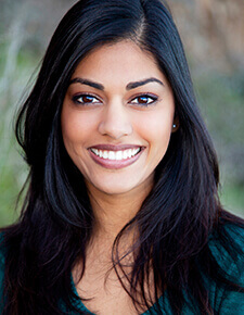 Woman smiling after cosmetic dentistry