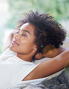 Woman relaxing after sedation dentistry