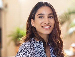 Person with tooth colored fillings smiling