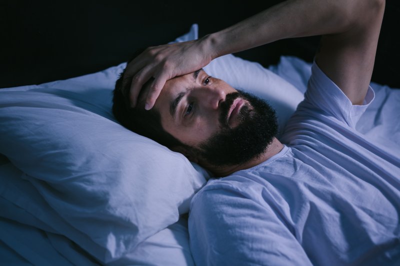 Patient looking down due to sleep apnea